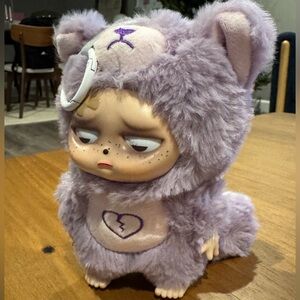 Sleepless Grumpipi “You You” — Purple Plush Pendant | Box opened from bottom
